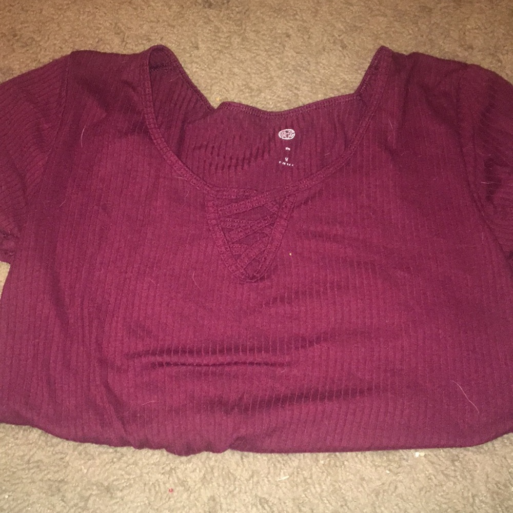 It’s a burgundy short sleeve tshirt
